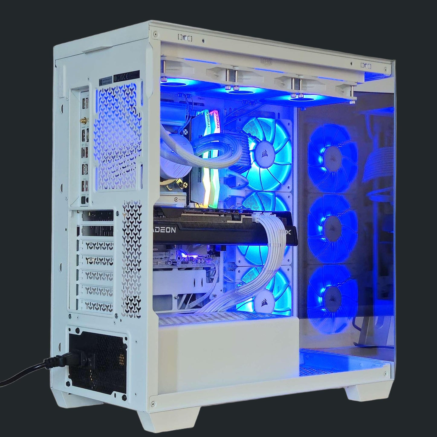Open computer case with visible internal components and blue LED lighting on a black background