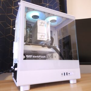 White custom gaming PC with blue RGB lighting, Radeon graphics card, and glass side panel, built in a micro-ATX case. - View from the lower side.
