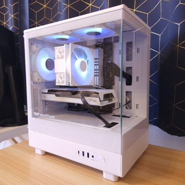 White custom gaming PC with blue RGB lighting, Radeon graphics card, and glass side panel, built in a micro-ATX case.