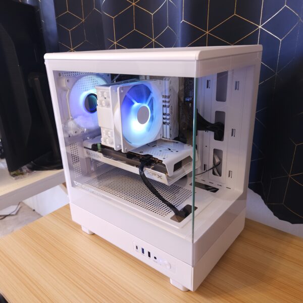 White custom gaming PC with blue RGB lighting, Radeon graphics card, and glass side panel, built in a micro-ATX case. View from the upper side.